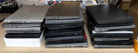 A quantity of pre-owned laptops sold for parts (All items with hard drives removed/remote management