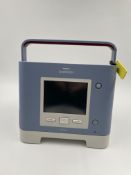 A pre-owned Philips Respironics Trilogy 202 (No battery included) (Untested, sold as seen for parts