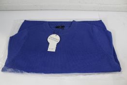 A women's Oui blau jumper with two pockets to front (Size 36).