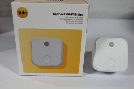 Yale Connect Wi-Fi Bridge - AC-R1 and a Yale Connect G Plug - 020-00163.