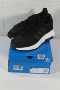 An as new pair of Adidas Retropy F2 Trainers in Black/White, Size UK 11.5 (Box Damaged).