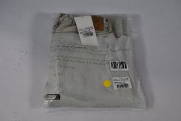 A pair of American Vintage Big Carrot super bleached five pocket Joybird jeans (Size EU 38).