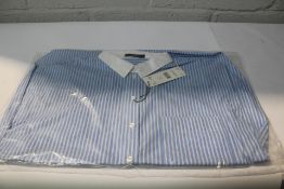 A women's Oui loose fit shirt in blue/white (Size 40).