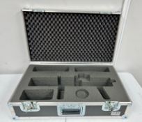 A pair of custom foam lined flight cases.