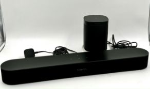A pre-owned Sonos One Smart Speaker (Gen 1) and a Sonos Beam Smart Soundbar (Gen 1) (HDMI and power