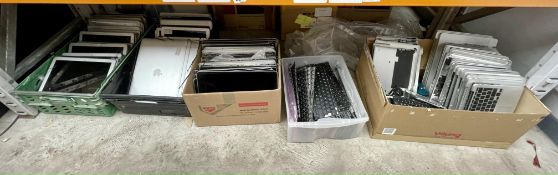 A quantity of pre-owned MacBook parts to include LCD's, Casings and Keyboards (All items sold as see