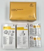Five boxed as new Cochlear implant accessories; 1 x Nucleus 8 Activity Kit, 2 x Power Extend Battery