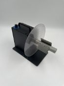 A boxed as new Labelmate MC-10 Universal Label Rewind Unit (P/N: LMR001/76-UK) (Box opened, damage t