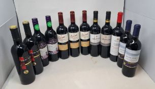 Twelve assorted red wines to include Azpilicueta Rioja, Beronia Rioja and Benicadell Valencia .