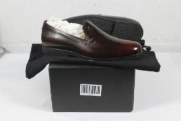 A pair of Tracey Neuls Smolder Double Colour Crepe Sole Loafers In Brown.