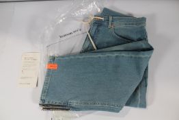 A pair of men's c'est normal 'The Jeans' (L).