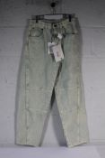 Alexander McQueen Breathe Slit High Waited Jeans in Light Denim, Size 27.