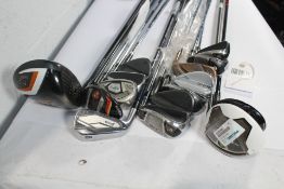 Fifteen Assorted Golf Clubs in Varied Conditions to include A Callaway X2 HOT, Cleveland Launcher HB