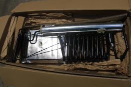 A fridge cooling unit (Viewing recommended).