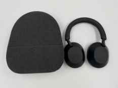 A pre-owned pair of Sony WH-1000XM5 Wireless Noise Cancelling Headphones with case, 3.5mm cable & US