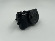 A pre-owned Canon PowerShot G7X Mark II Digital Camera (No batteries or accessories included) (Rear