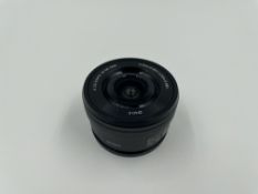 A pre-owned Sony 16-50mm f/3.5-5.6 OSS E-mount Lens (P/N: SELP1650.AE) (Boxed).