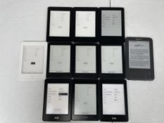 Eleven pre-owned Amazon Kindle E-Readers (Assorted models and conditions).