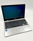 A pre-owned ASUS Laptop E210M 11.6