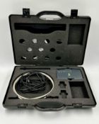 A pre-owned Schneider Electric TRV00911 USB Maintenance Interface with cables in travel case (Untest