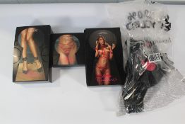 Four Items of Hunkmoller Private Collection to include Jadore String Tanga in Tango Red, Size UK M,