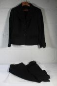 A pre-owned Escada jacket (42) and matching skirt (44) - Black.