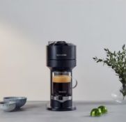 A Nescafe Vertuo Next Coffee Machine in Black (REF: GCV1-GB-ME-NE). As New.