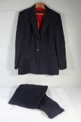 A pre-owned Escada Suit (woman's) - Blue/Red Pin-Stripe (44)