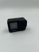 Pre-owned GoPro HERO10 Black Camera with battery & Samsung Evo 64GB micro SD card.