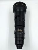 Pre-owned Nikon AF S Nikkor 600mm f/4G ED VR IF Lens in a Nikon CT-607 Trunk Case (Nikon HK-35-1/2 l
