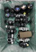 A collection of vintage cameras and lenses including Zenith, Nikon & Canon (All items untested, sold