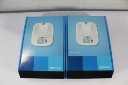Three Medtronic MyCareLink 24952.