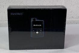 A Medtronic MiniMed 780G Insulin Pump, REF: MMT-1895WW, EXP: 2026-02-27. As New and Sealed.
