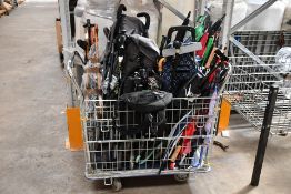 A Quantity of Pre-owned Umbrellas, Walking Sticks and 2 Push Chairs.