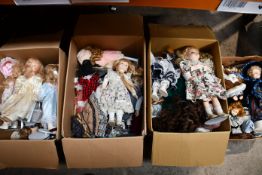 Four Boxes of Assorted Porcelain Dolls, Various Outfits. Pre-owned