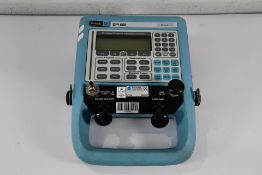 A Druck DPI 605 Portable Vacuum/Pressure Calibrator. Pre-owned, Untested. Viewing is Advised.