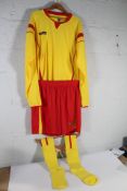 A Pallet Containing Two Hundred and Fifty Sunday League Football Kits, Yellow and Red (Assorted Size