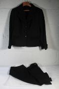 A pre-owned Escada jacket (42) and matching skirt (44) - Black.