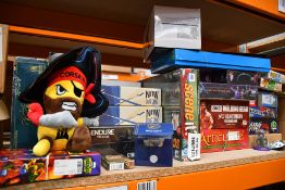 A quantity of Assorted New and Pre-owned Board Games, Toys and Related.