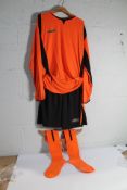 A Pallet Containing Two Hundred and Fifty Sunday League Football Kits, Orange and Black (Assorted Si
