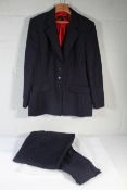 A pre-owned Escada Suit (woman's) - Blue/Red Pin-Stripe (44)