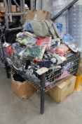 A large basket of assorted new clothing and related items (Basket not included)