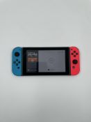 Pre-owned Nintendo Switch Console (HAC-001-01) with Joy-Con Controllers, Comfort Grip, Dock, Charger