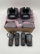 Twelve pre-owned Datalogic 95A151047 Docking Cradles & four Datalogic scanners.
