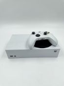 Pre-owned Microsoft Xbox Series S with controller.