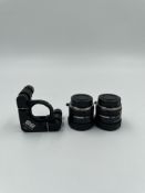 Two pre-owned Computar 12mm F1.4 2/3 Lenses and a Edmund Optics Kinematic Mount.