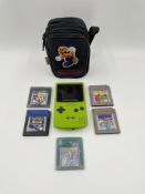 Pre-owned Nintendo Game Boy Colour Console in Lime Green with five game cartridges including Pokémon