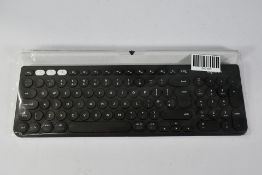 A Logitech K780 Bluetooth Keyboard. As New without Box.