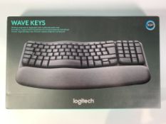 Logitech Wave Keys QWERTY Wireless Keyboard with cushion palm rest, Black. Unused In box