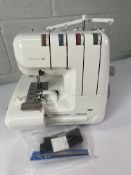 Husqvarna Viking Amber S100 Overlocker Sewing Machine - Pre-owned (has some minor damage).